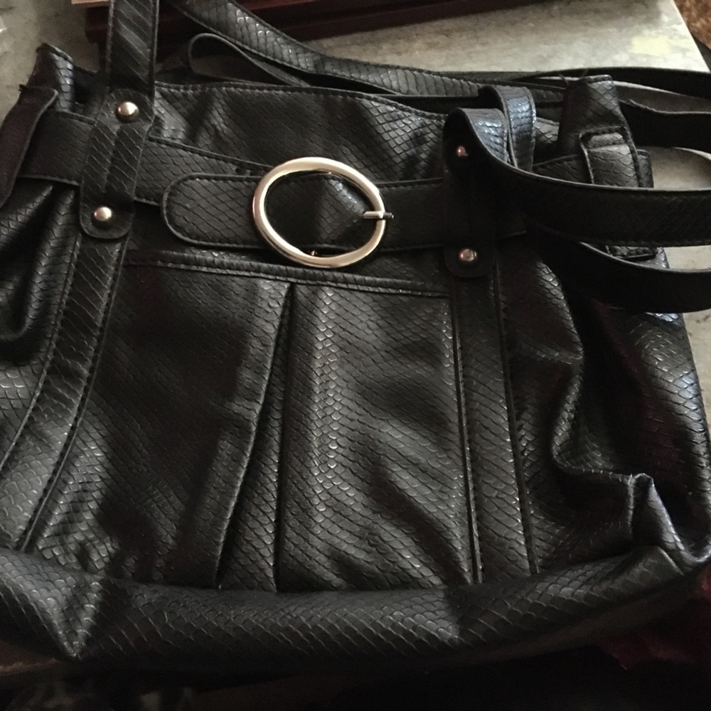 Womens black purse never used very light weight